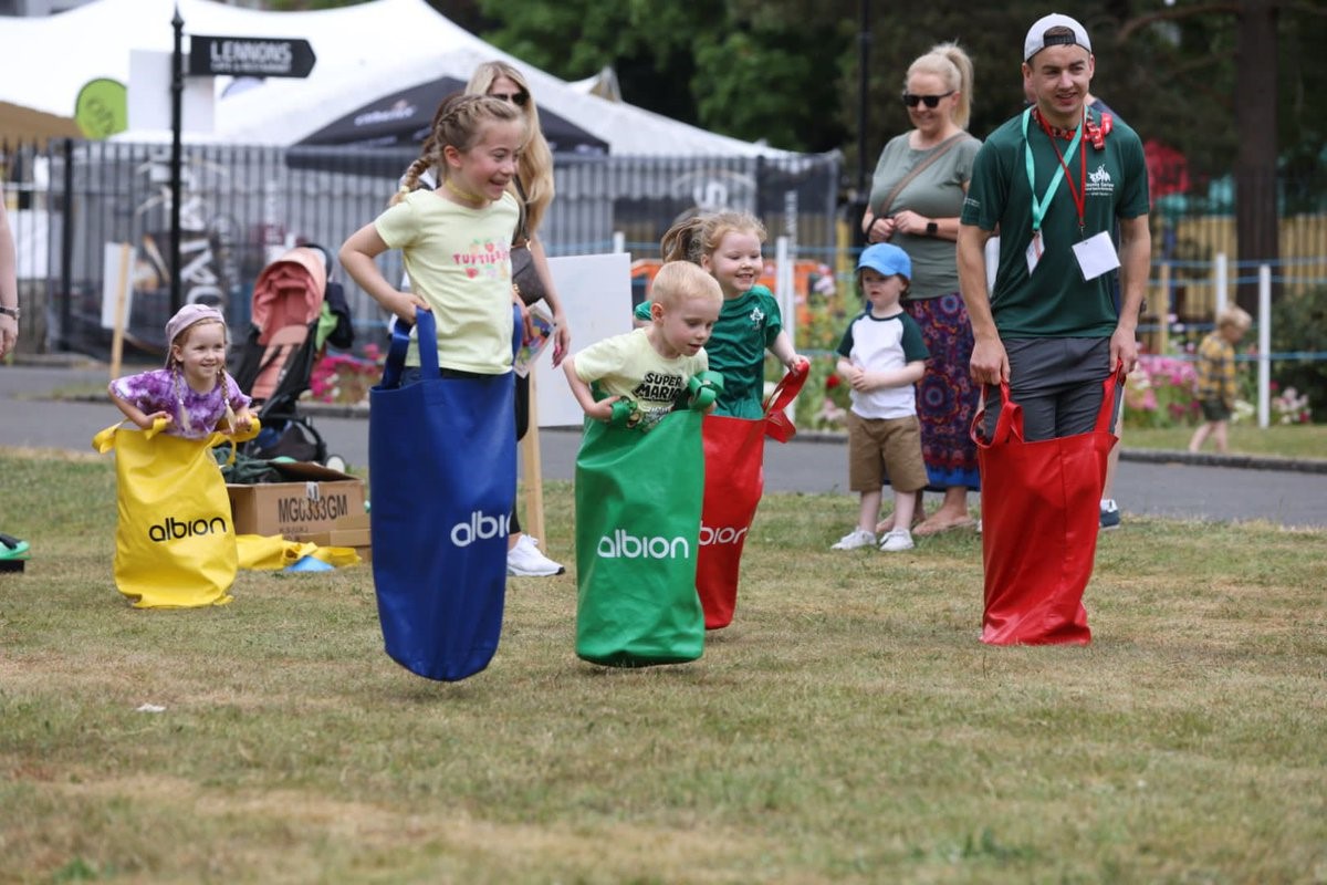 Chapter 8 Title Image of children taking part in a sack race